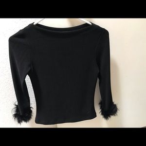 Sarah Boat Neck.  long feather sleeve